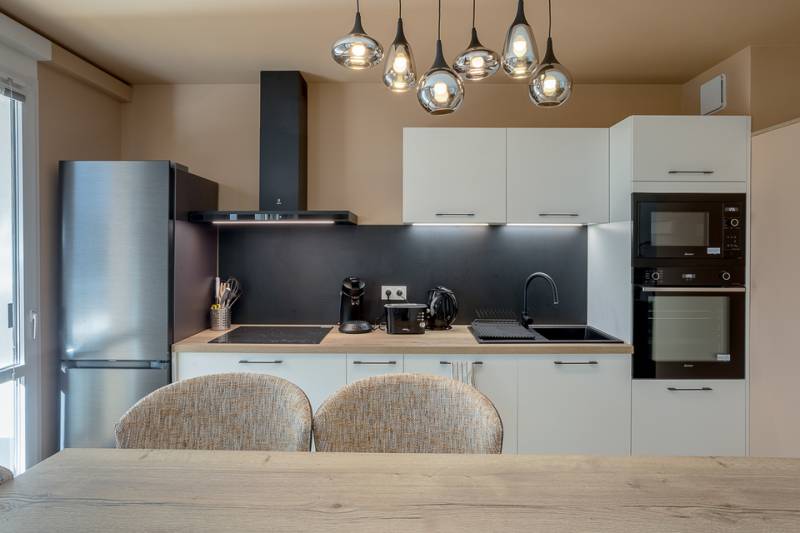 Cuisine ouverte sur séjour - Photo Jerome Salort